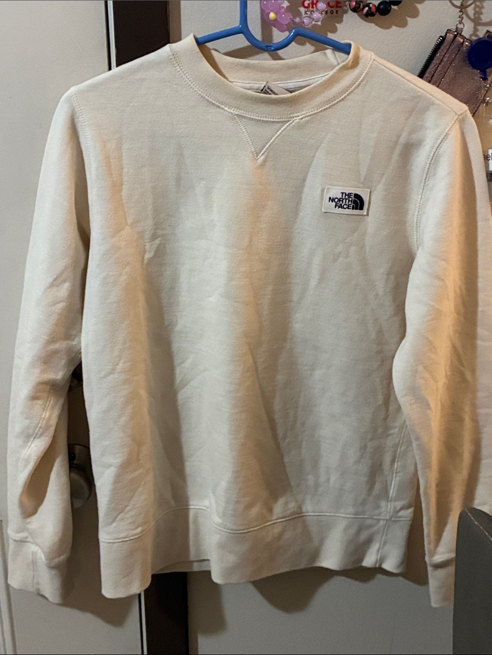 The North Face women Cream/Off-White Crewneck Sweatshirt